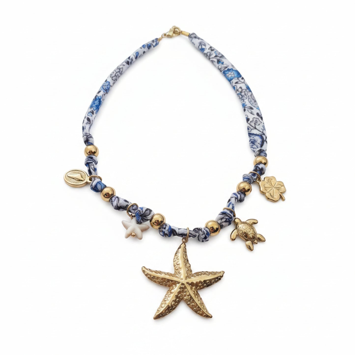 COLLANA STELLA MARINA CON TESSUTO FANTASIA BLU E BIANCO IN ACCIAIO GOLD
