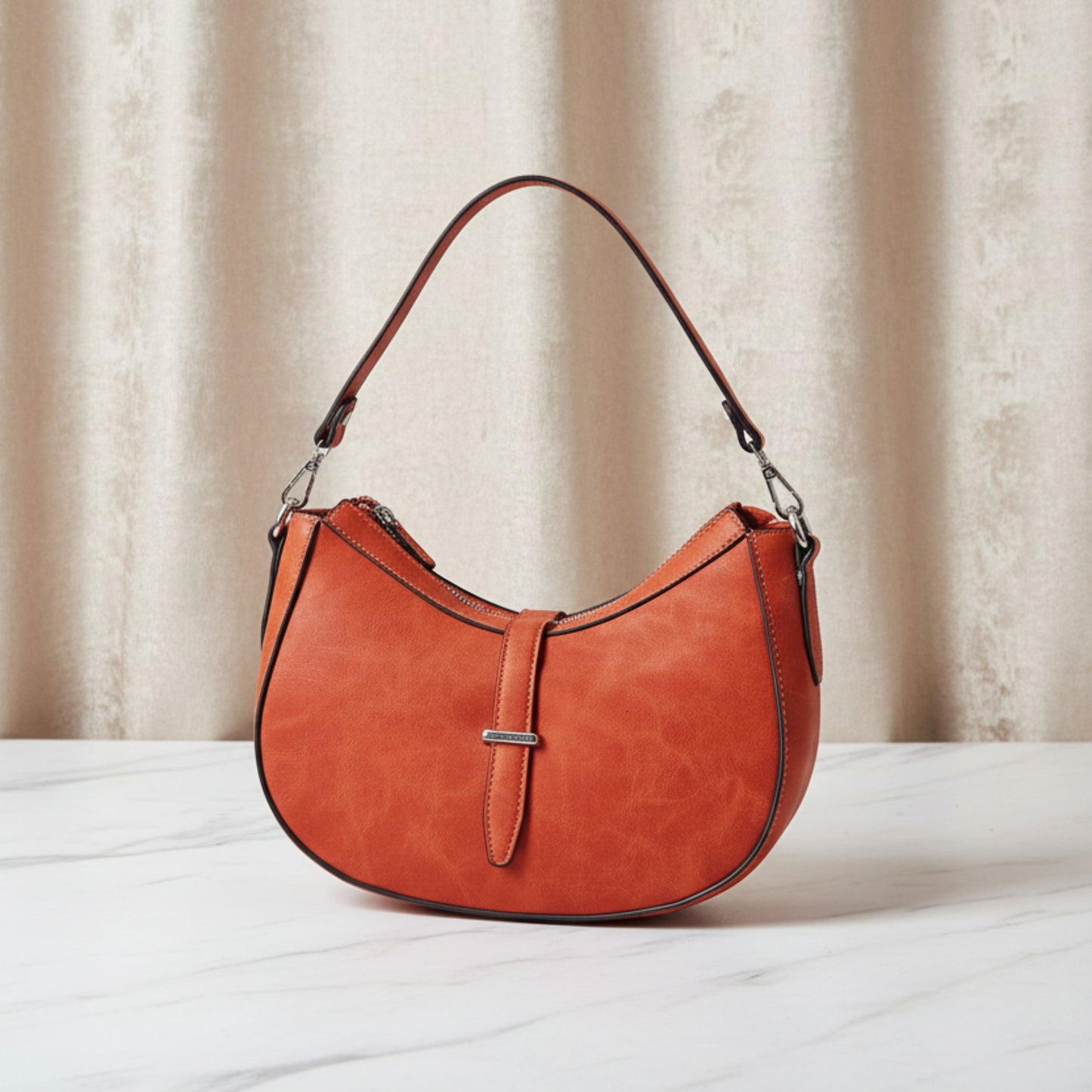 BORSA A MEZZALUNA SCAMOSCIATA ARANCIONE CON DOPPIA TRACOLLA REMOVIBILE