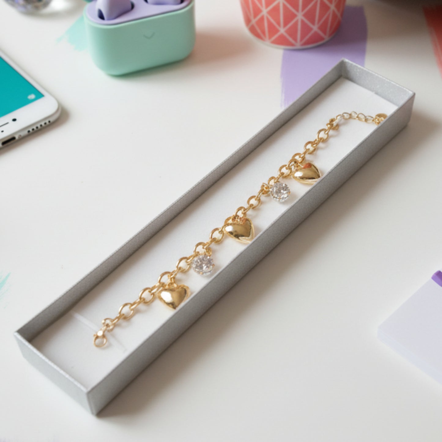 BRACCIALE ACCIAIO CON CHARM A CUORE E SFERE CON BRILLANTINI-DI TENDENZA