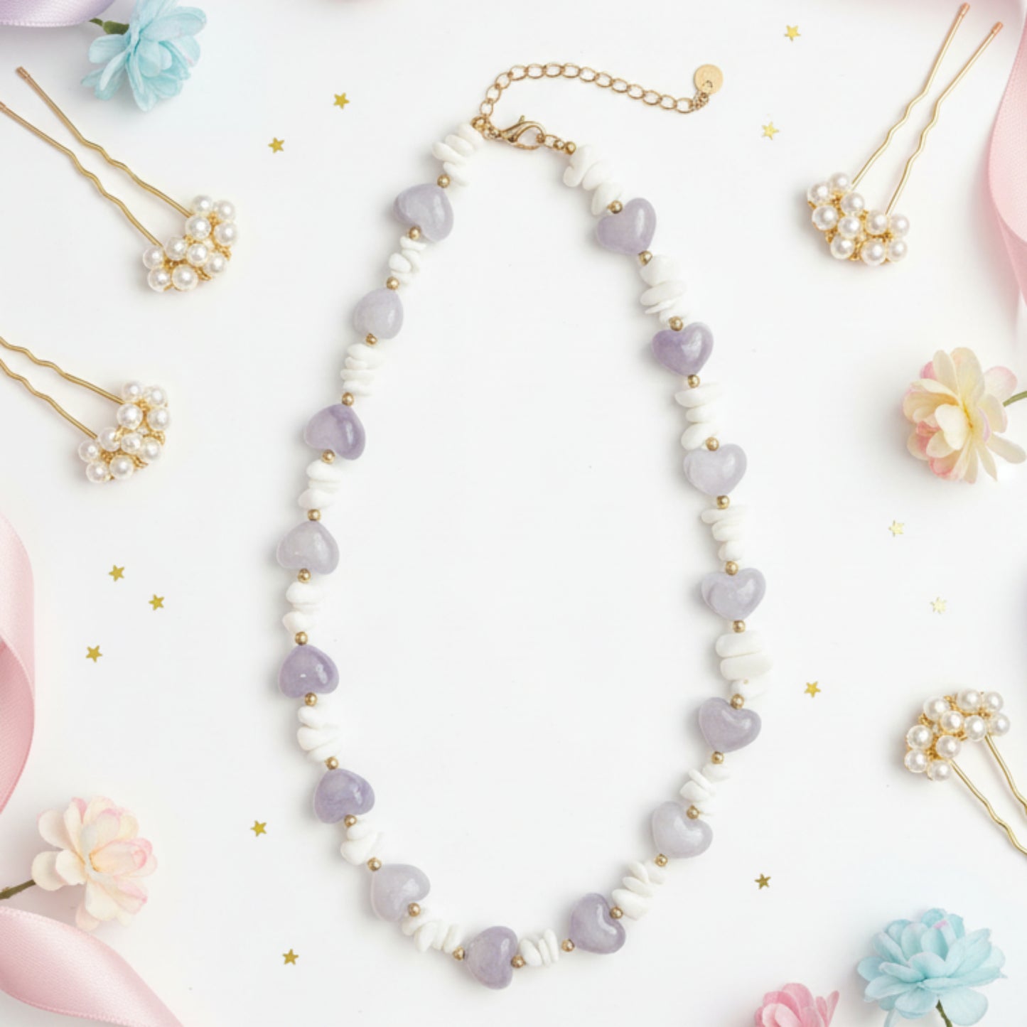 COLLANA CUORE IN ACCIAIO INOX GOLD E PIETRE BIANCHE/LILLA