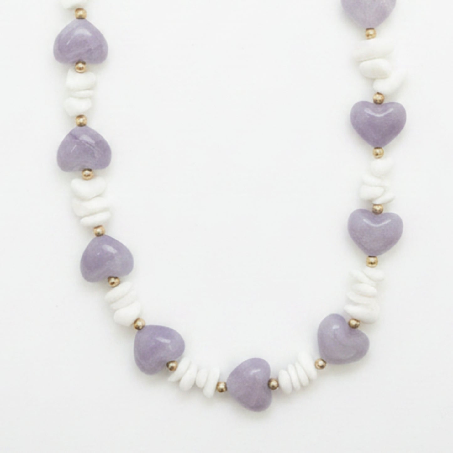 COLLANA CUORE IN ACCIAIO INOX GOLD E PIETRE BIANCHE/LILLA