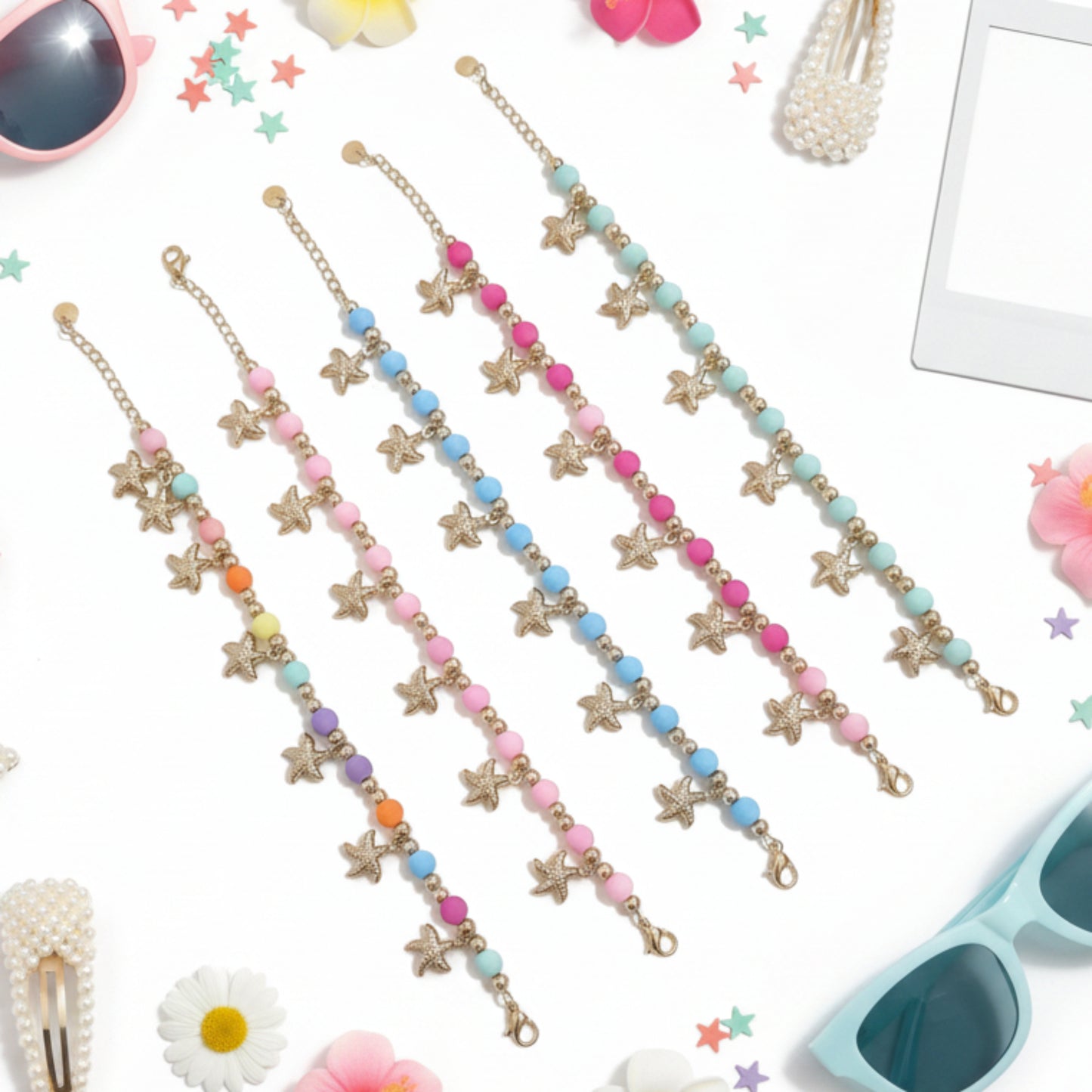 BRACCIALE IN ACCIAIO GOLD ESTIVO CON PERLINE COLORATE E STELLE MARINE