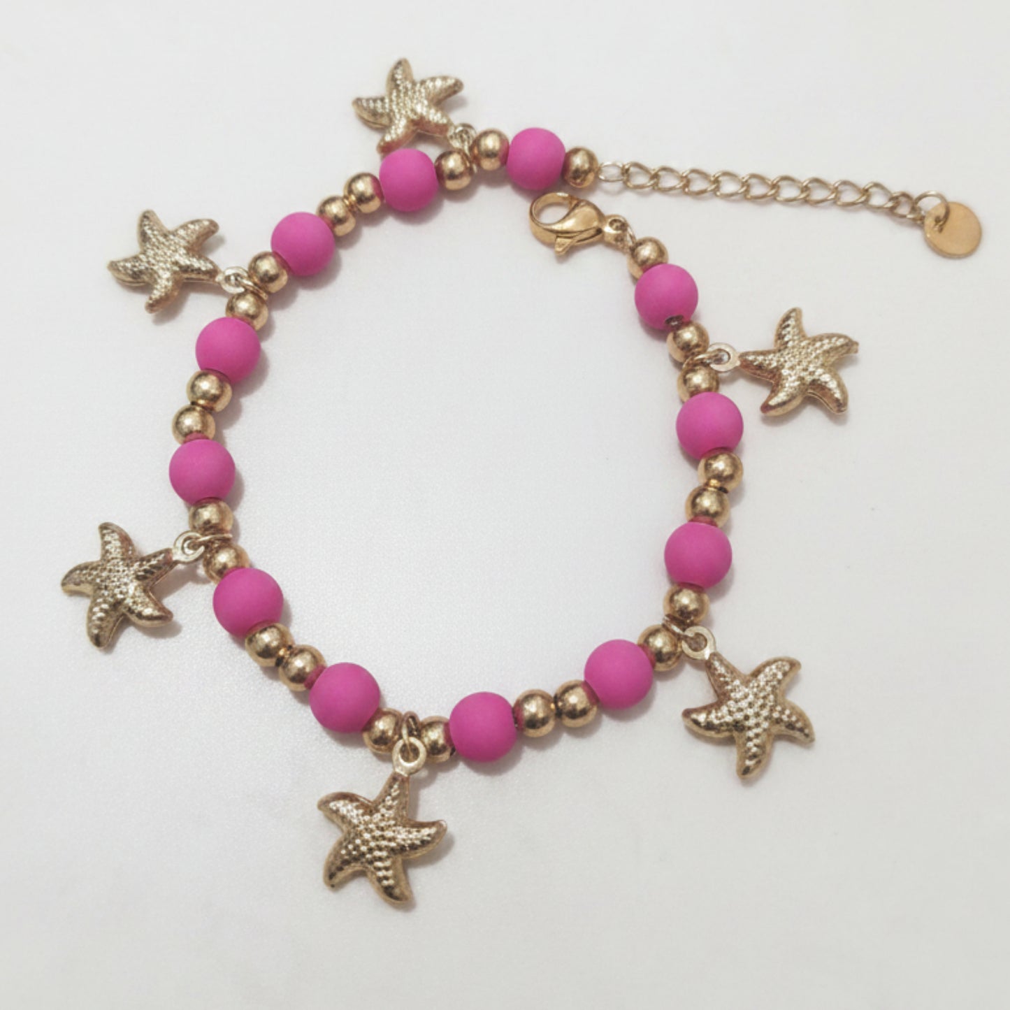 BRACCIALE IN ACCIAIO GOLD ESTIVO CON PERLINE COLORATE E STELLE MARINE
