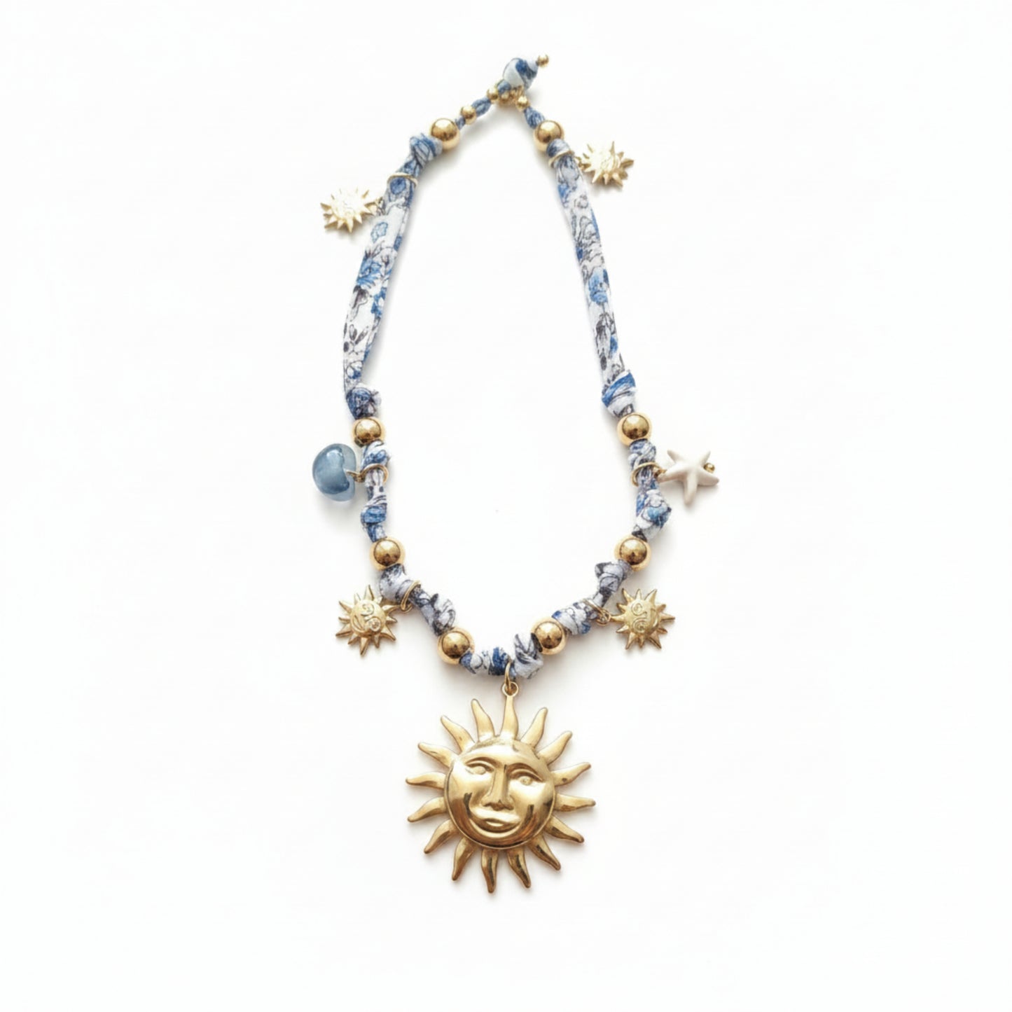COLLANA SOLE CON TESSUTO FANTASIA BLU E BIANCO IN ACCIAIO GOLD REGOLABILE