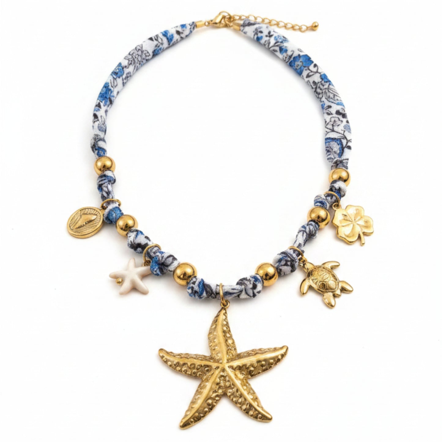 COLLANA STELLA MARINA CON TESSUTO FANTASIA BLU E BIANCO IN ACCIAIO GOLD
