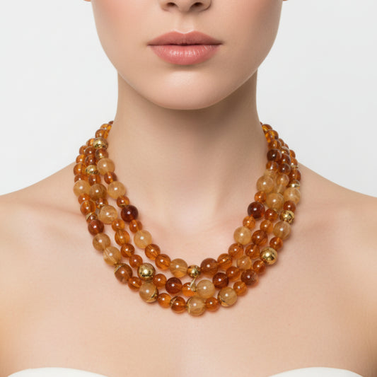 COLLANA CON PIETRE EFFETTO AMBRA A 3 FILI E CHIUSURA A CATENA IN ACCIAIO